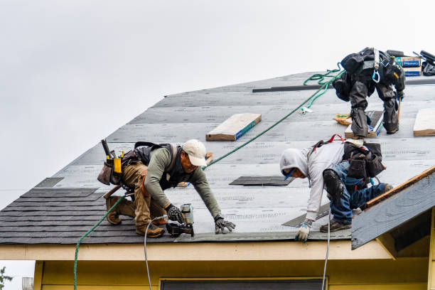 Professional Gutter Installation technician working in Stuart, FL